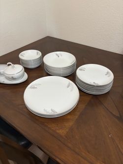 White Porcelain Dinnerware Set with Gray Floral Detail