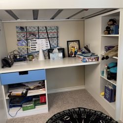Space-Saving Bunk Bed with Cupboard and Built-In Reading Table - Perfect for Kids' Bedrooms!