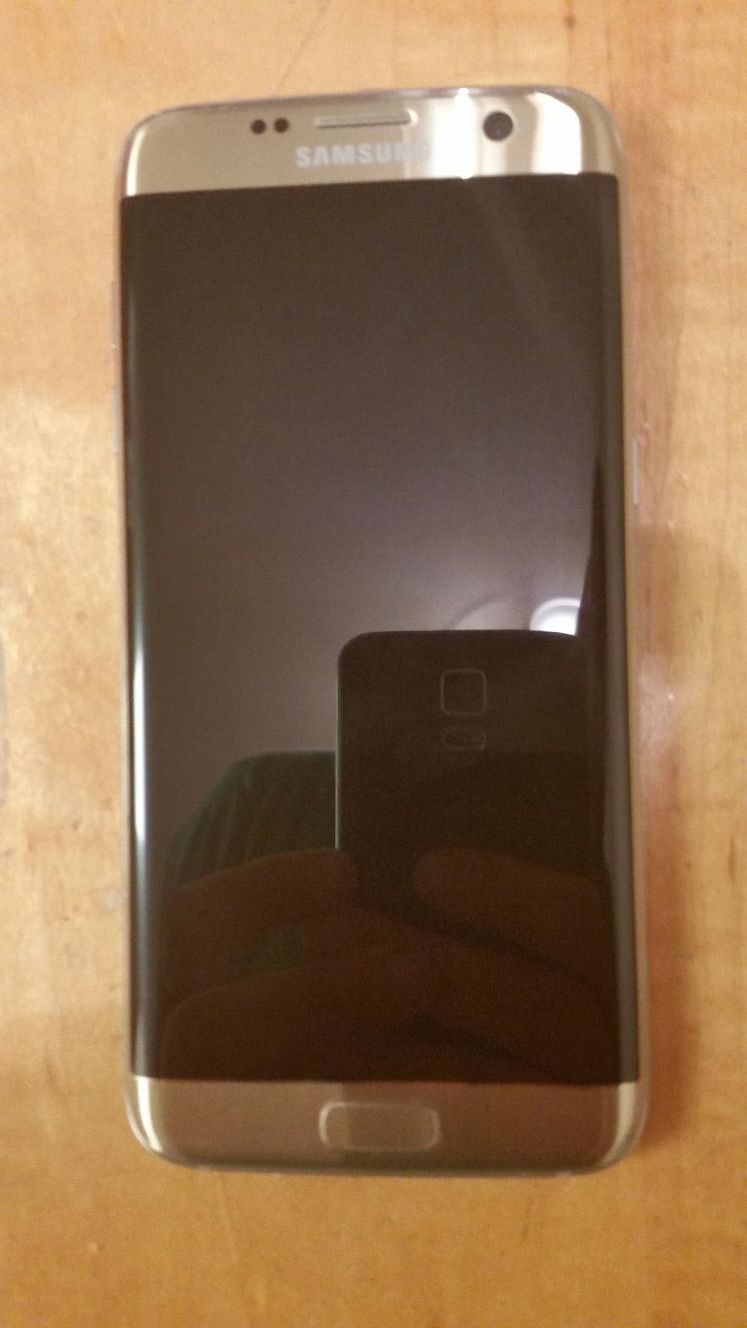 Samsung Galaxy S7 Edge Verizon with warranty, OtterBox Symmetry case and Qmadix liquid glass screen protector