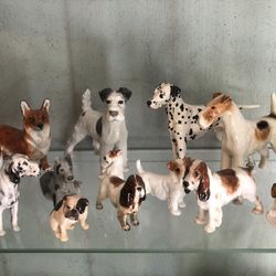 Dog figurines. Royal Doulton, Beswick, and Bing &Grondahl.
