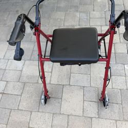 Rollator walker with seat 