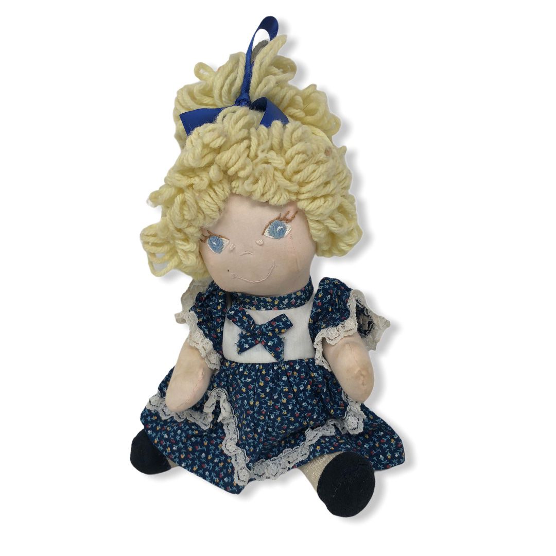 Collectible toy yarn hair doll