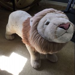 Stuffed “Ride On” Lion