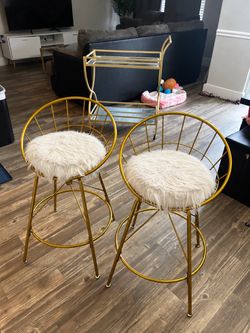 Set of two white and gold bar stools