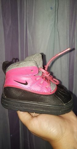 Pink and top black acg boots