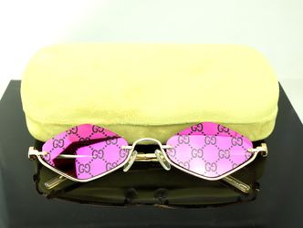 Gucci Geometric Sunglasses in Gold with Pink GG Logo Mirror Lens