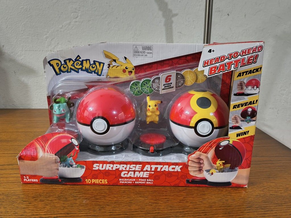 New! Pokemon Surprise Attack Game, Featuring Pikachu and Bulbasaur - 2 Surprise Attack Balls - 6 Attack Disks