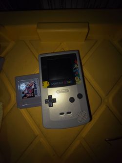Gameboy color with hockey game .