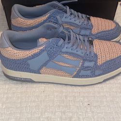 the Amiri Raffia Skeleton Low-Top Sneaker in a blue and beige colorway