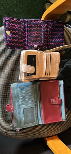 Three Wallets And Four Keychains