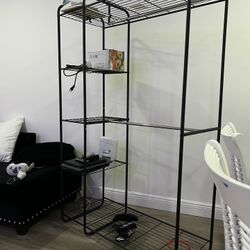 Closet For Clothes With Racks And Levels For Storage