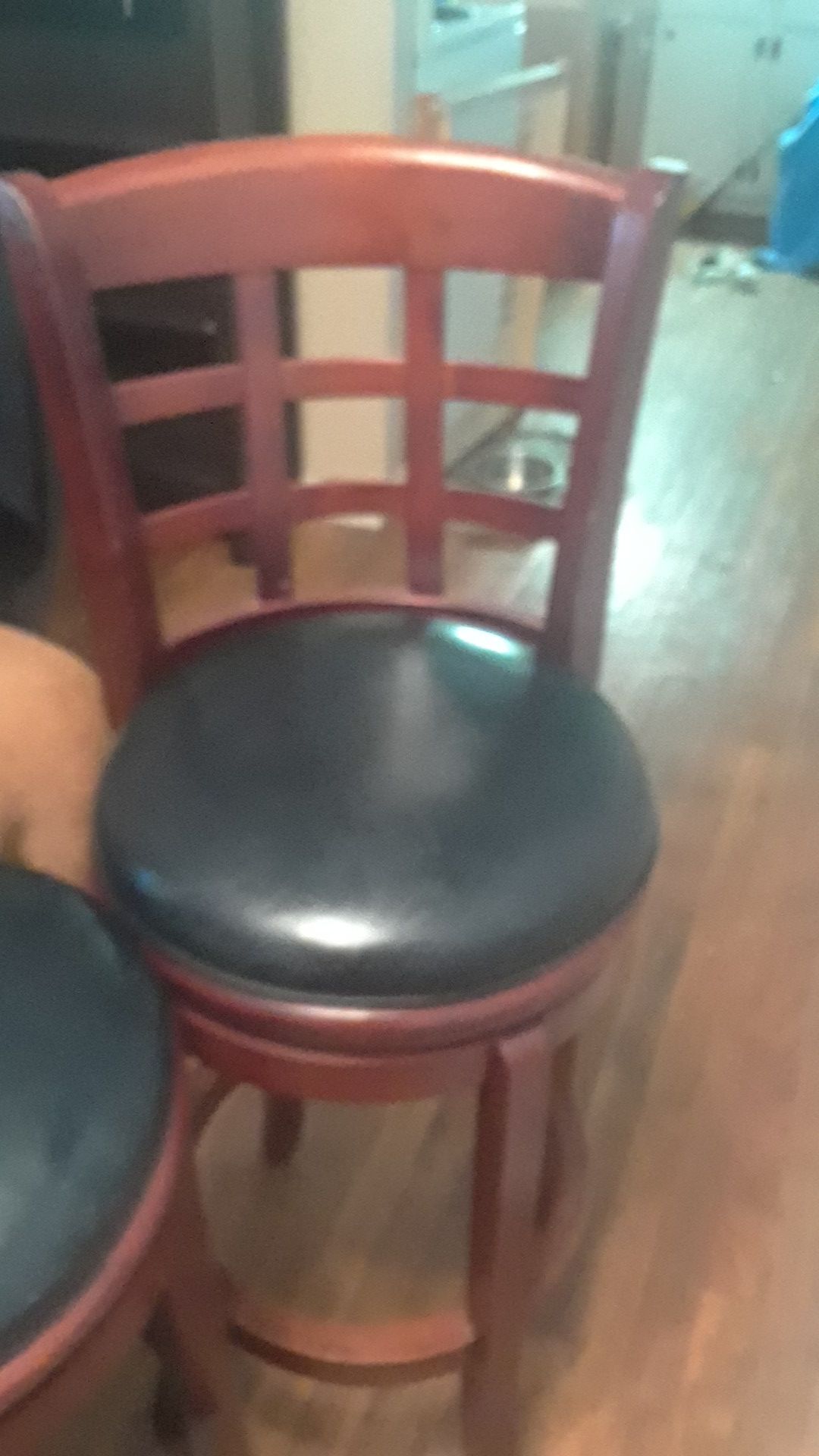 3 barstools they turn leather on seat part wood everywhere esle