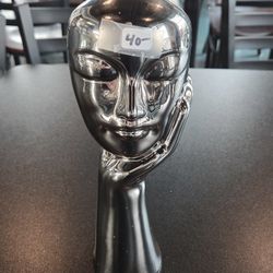Women Face In Hand Chrome Finish