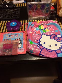 Hello Kitty backpack with book and beads