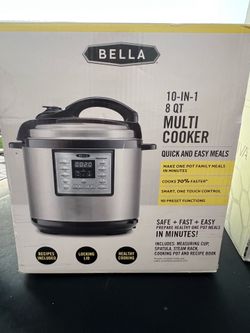Pressure cooker by Open box. Never used or taken out