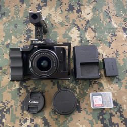 Canon EOS M50 Mirrorless Camera with Lens, Cage and Accessories