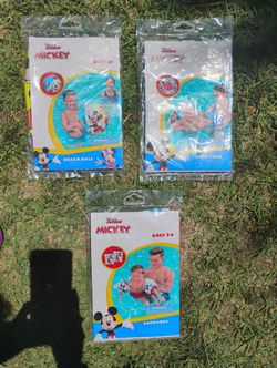 Mickey mouse pool ring, armbands, and beach ball $3 each
