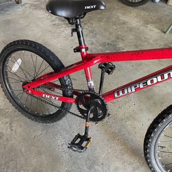 Red Wipeout Bike With Black Spokes