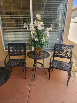 Patio set:1 table, 2 chairs . It'snotaluminum..made of heavy iron
