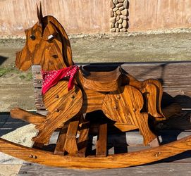 Handcrafted wooden rocking horse