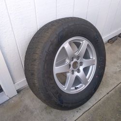 Selling (Single) F150 Spare Tire 265 70 18...6x135mm: Brand New  $145 Cash ..or...trade For Car Audio