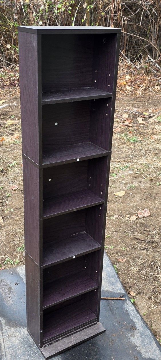 DVD/VCR MOVIE SHELF.