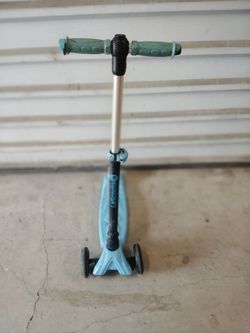 Blue and black 3-wheel children's kick scooter featuring a T-bar handlebar and a wide foot deck