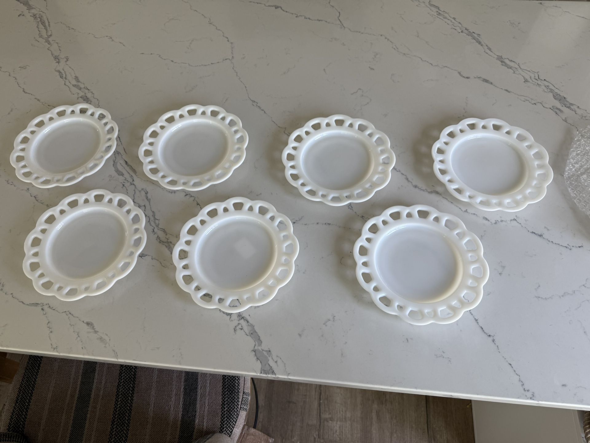 7 Milk Glass Lace Plates