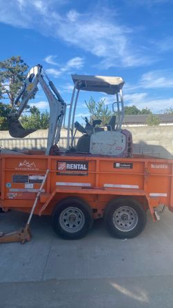 2018 / 216 Takeuchi w/ dump trailer