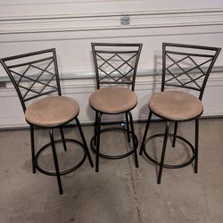 3 Brown Swivel Bar Stools