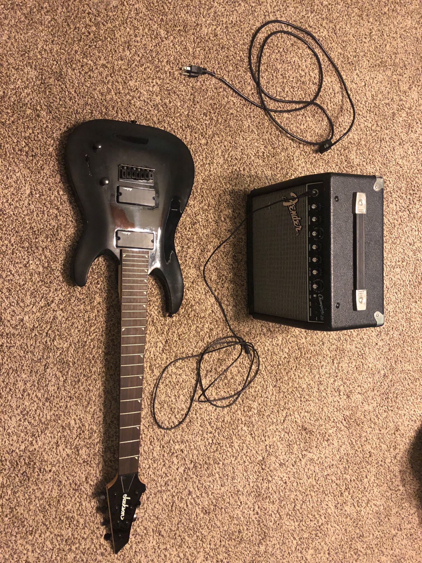 Jackson 7 string guitar and small fender amp (no strings on guitar and amp comes with power cable)