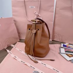 New hand-stitched leather bucket bag