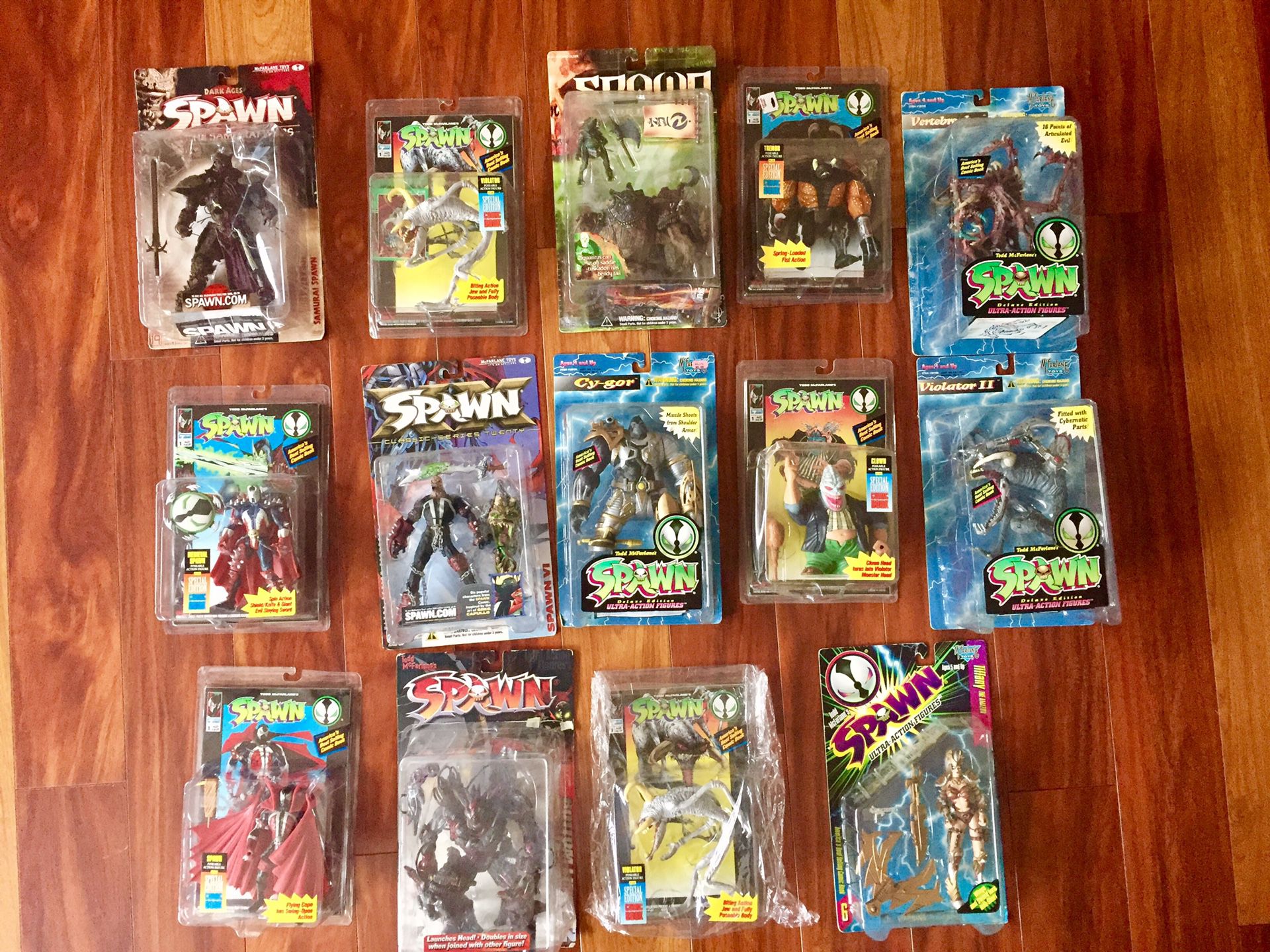 14 SPAWN ACTION FIGURES/ TOYS IN GOOD CONDITION.