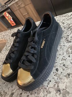 Black and Gold Pumas