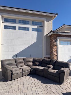Grey sectional with recliners