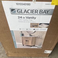 Glacier Bay Cranwood 25 in. Single Sink Freestanding Sandstone Bathroom Vanity with White Cultured Marble Top (Assembled) 
