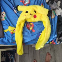 Pikachu hat when you squeeze the little things, the ears flap up