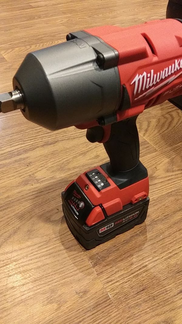 Milwaukee Half Inch Impact Wrench With A 5 0 Battery For In Milwaukee Half Inch Impact Wrench With A 5 0 Battery