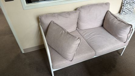 Outdoor loveseat with metal frame