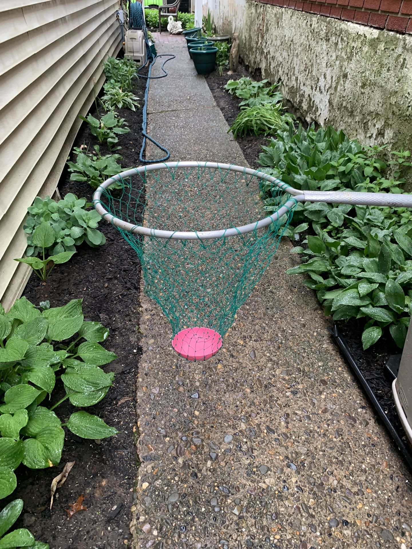 fishing net is 20 deep 14 1/2 to 15 round handle is 18 long total length is 34 in