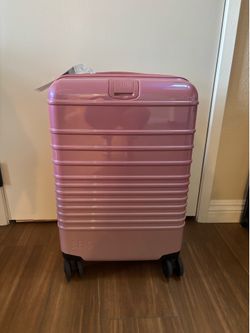 Beis brand new carry on Wicked pink luggage