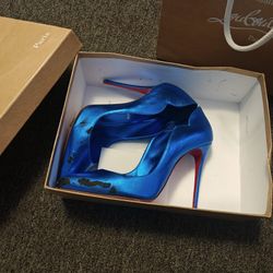 Christian Louboutin (Red Bottoms)