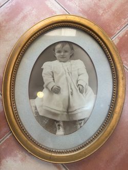 Antique Oval Gold Frame with Black & White Portrait