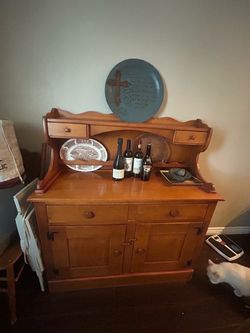 Vintage Early American maple dinner hutch