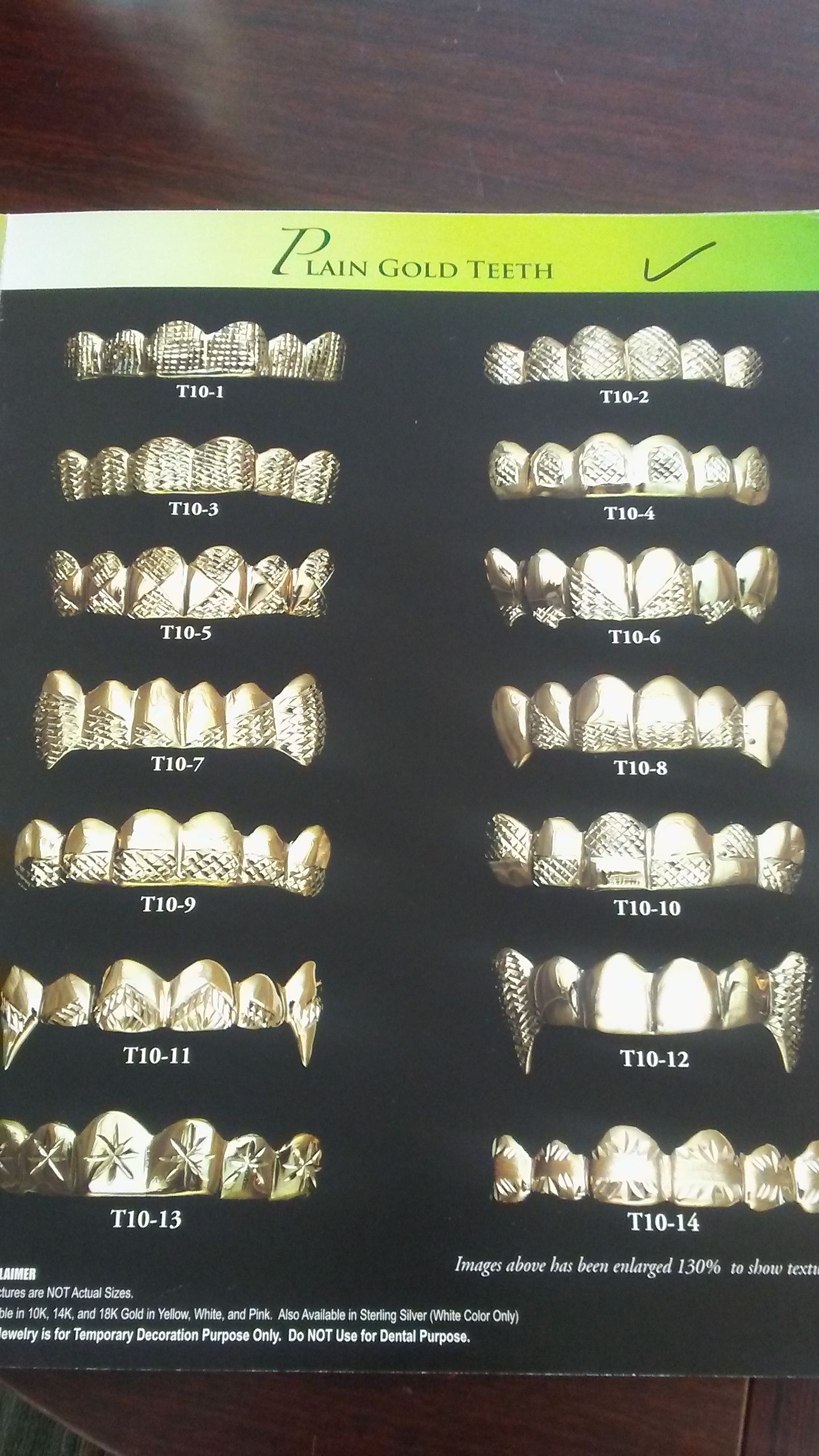Custom made gold teeth grillz