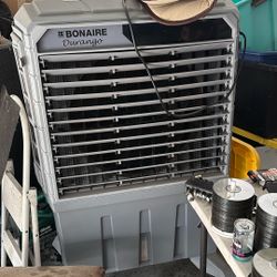 Swamp cooler or evaporated cooler works great