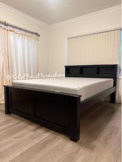 Black queen bed and mattress