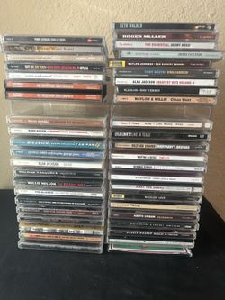 45+ Mixed Country Music CD’s with CD rack