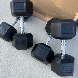 new  pair of 45lb and 50lb rubber dumbbells  $190