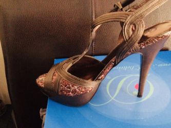 Bronze/shiny brown, Leo/Black patent Sz 9. Still in box